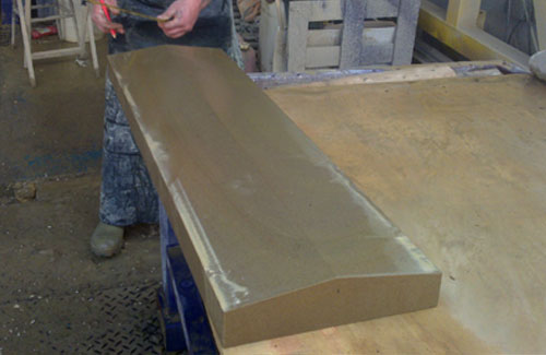 Stone Mason Making Coping Stones